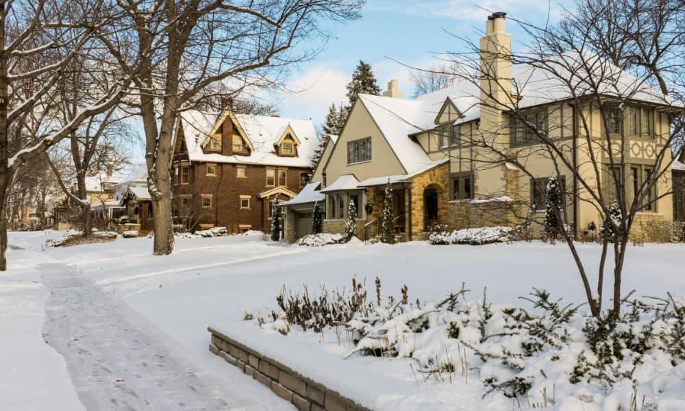 minneapolis land survey residential property - ALTA SURVEY Minneapolis Snow-covered homes in a Minneapolis neighborhood, highlighting the need for a land survey before buying residential property.