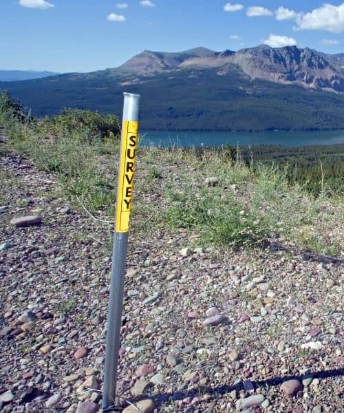 A survey marker on rocky terrain used to confirm control points during a topographic survey