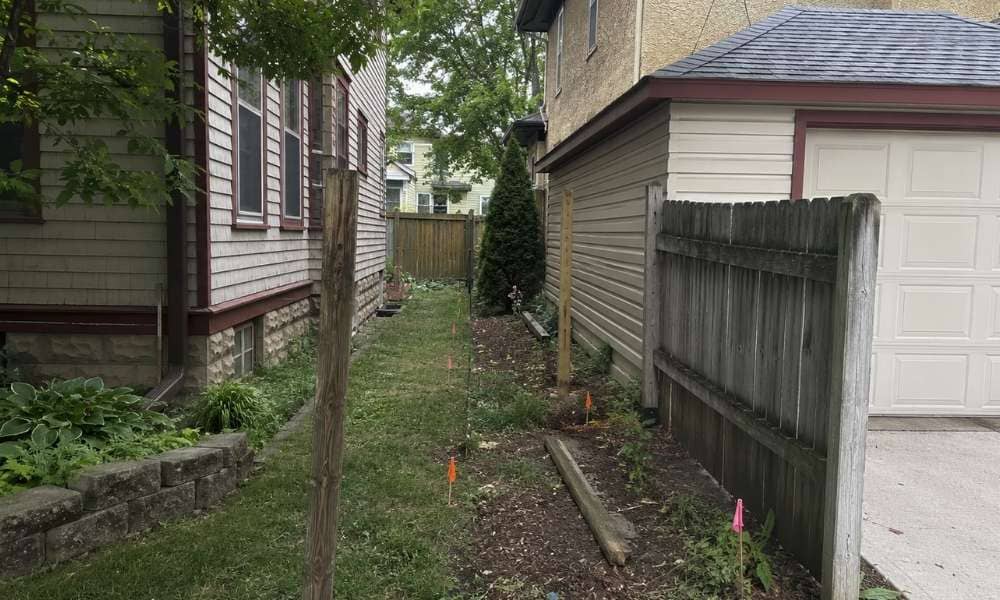 Property survey for fence minneapolis - ALTA SURVEY Minneapolis Property survey for fence installation showing survey markers along a shared lot line between neighboring homes in Minneapolis